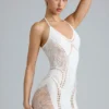 Vestido Tori con cuello halter y adornos en color marfil